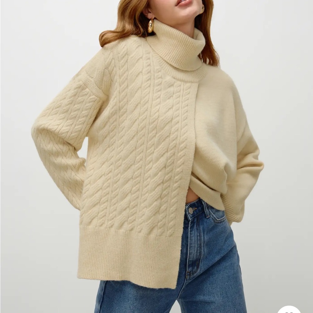 Cream turtleneck sweater.